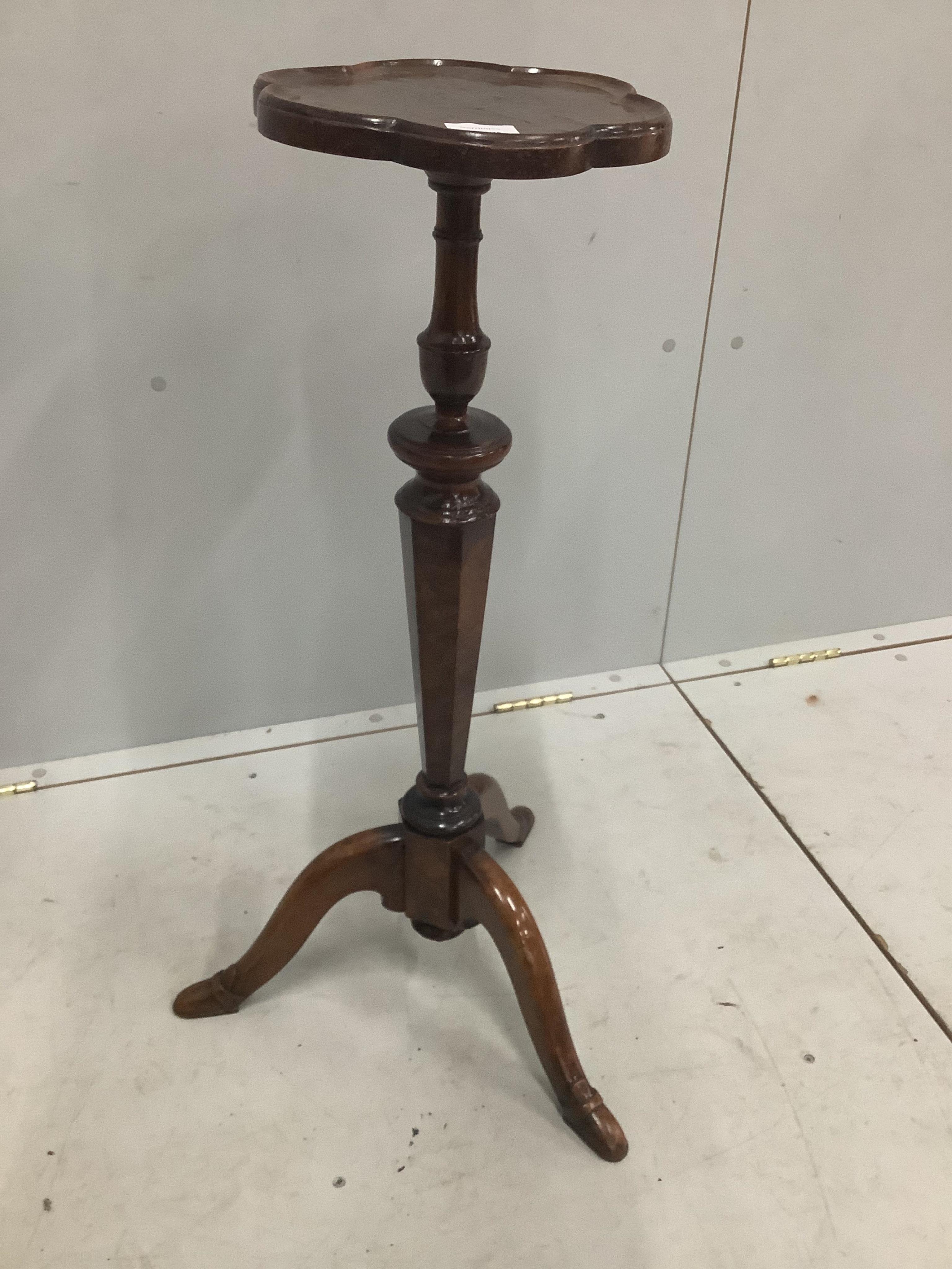 A rare early 18th century maple and burr maple veneered torchere stand, the tripod base with unusual shoe shaped feet, height 80cm. Condition - fair to good